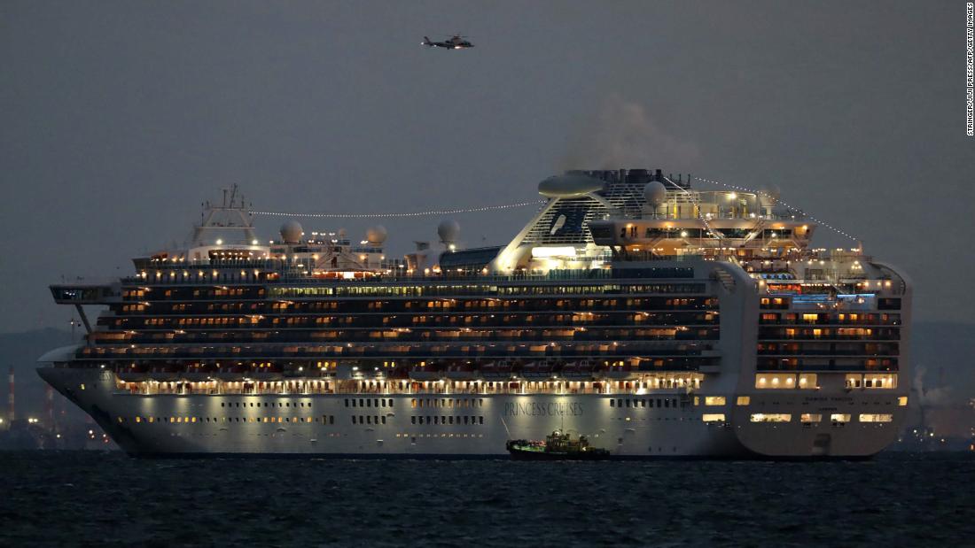 The Diamond Princess cruise ship sits anchored in quarantine off the port of Yokohama on February 4. It arrived a day earlier with passengers feeling ill.